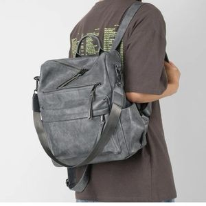 Gray vegan leather zipper detail mini backpacks